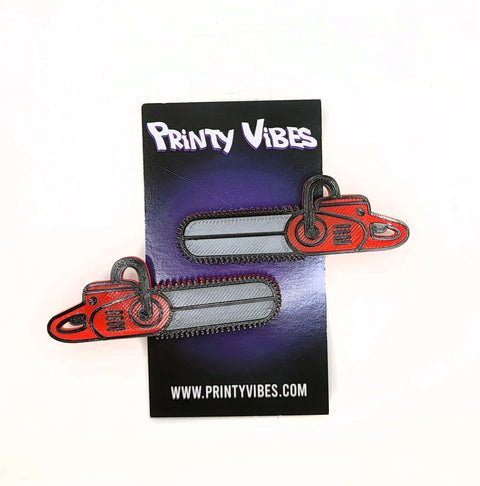Pinza para el pelo con diseño de motosierra roja Printy Vibes