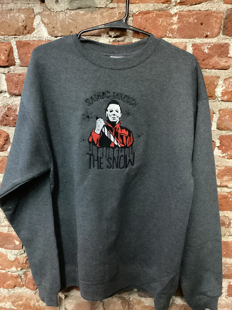 StitchnStabs Embroidered Slashing Through the Snow Crewneck