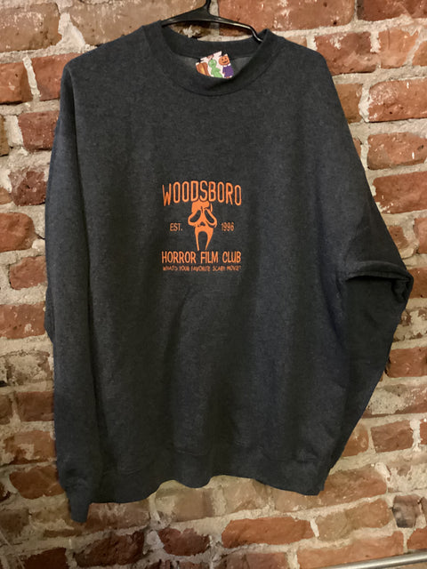 StitchnStabs Embroidered Orange Woodsboro Crewneck