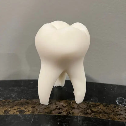 Vela moldeada con dientes de Susan Schomig's Creations